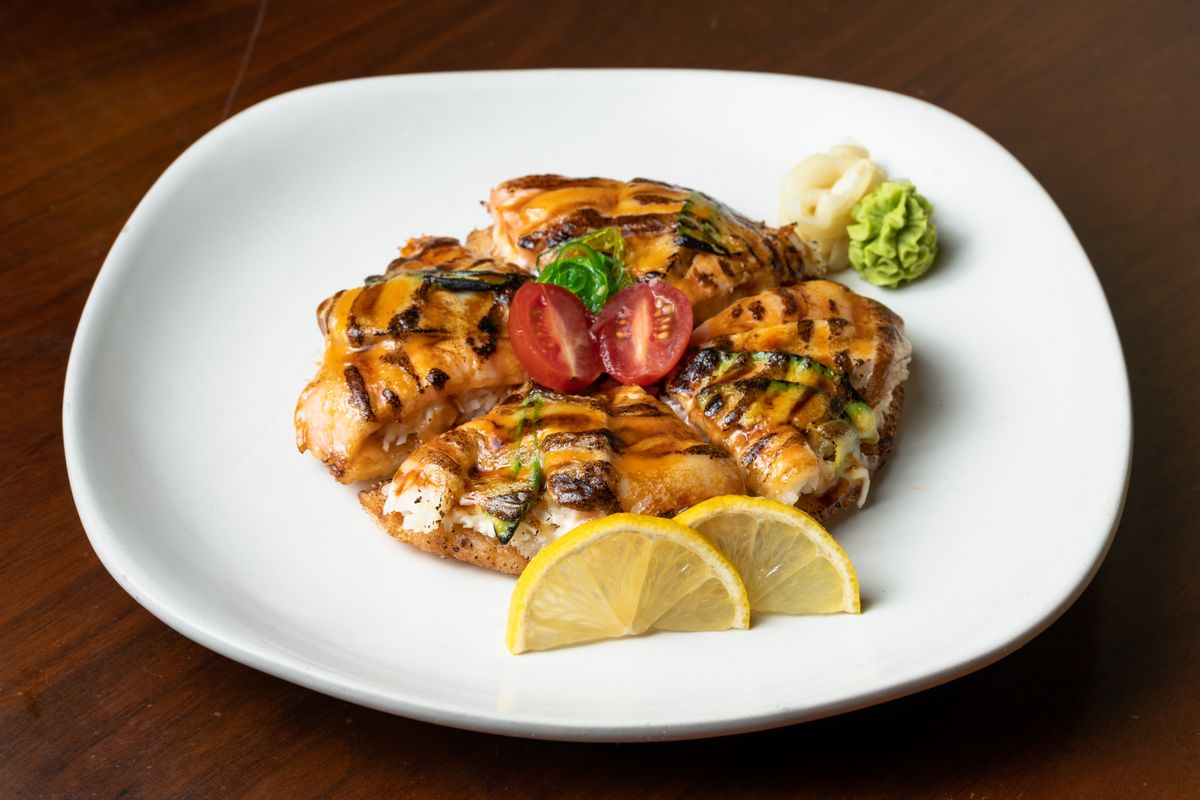 Sushi Pizza - Deep-fried rice with salmon, tuna, ebi, avocado Aburi